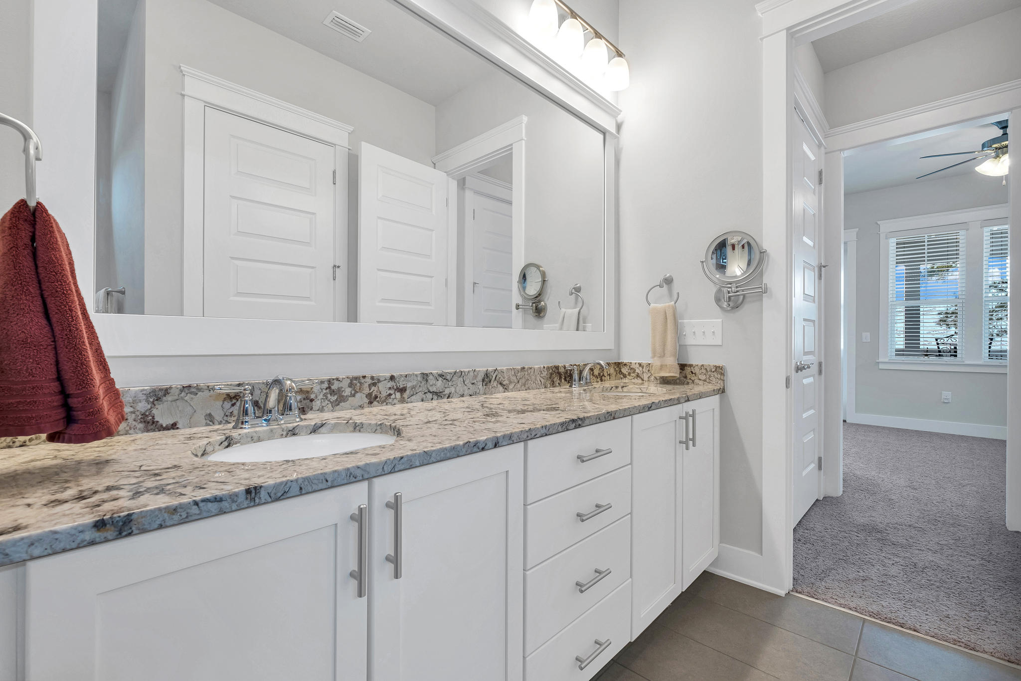 91 Grande Pointe Circle Inlet Beach, FL 32461 - Photo 33 of 49 a bathroom with a granite countertop sink and a mirror