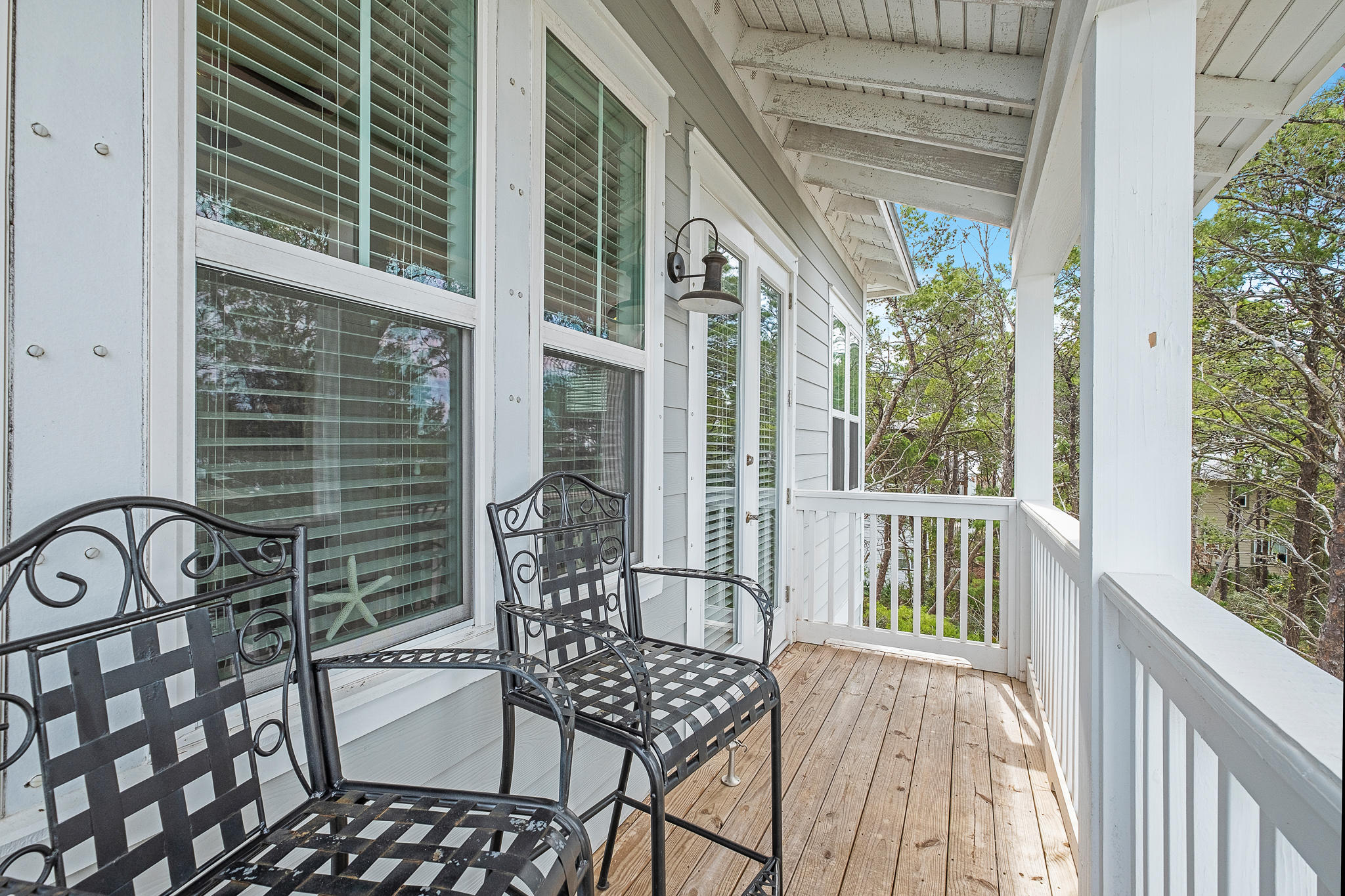 91 Grande Pointe Circle Inlet Beach, FL 32461 - Photo 35 of 49 a view of balcony with wooden floor