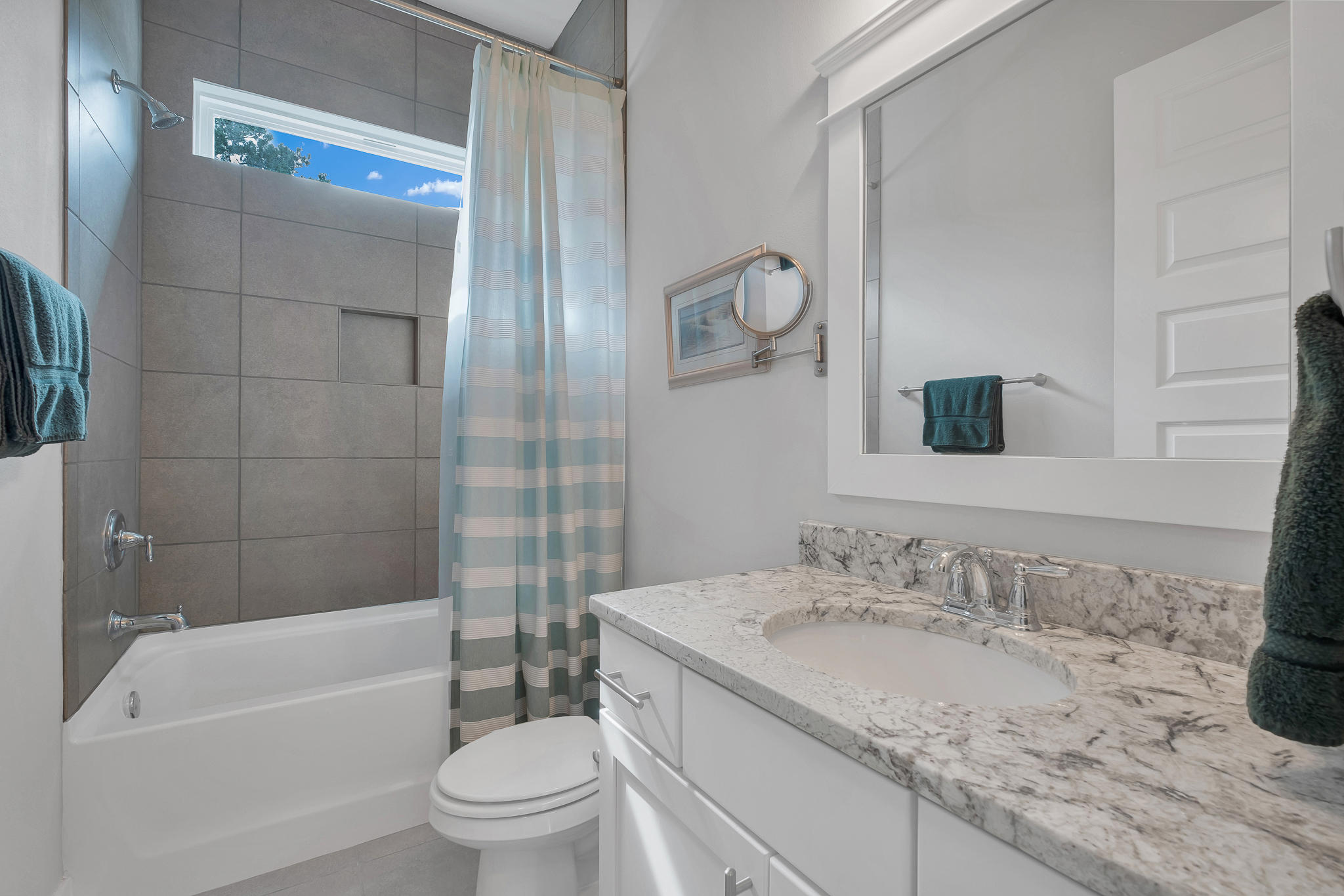91 Grande Pointe Circle Inlet Beach, FL 32461 - Photo 39 of 49 a bathroom with a granite countertop sink a toilet and bathtub