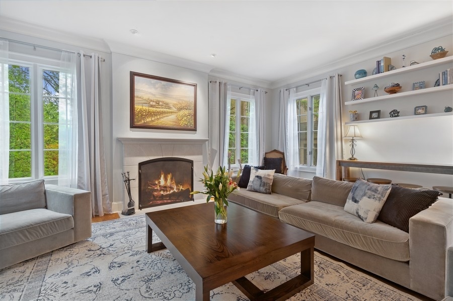 501 Ridge Road Kenilworth, IL 60043 - Photo 12 of 46 a living room with furniture and a fireplace