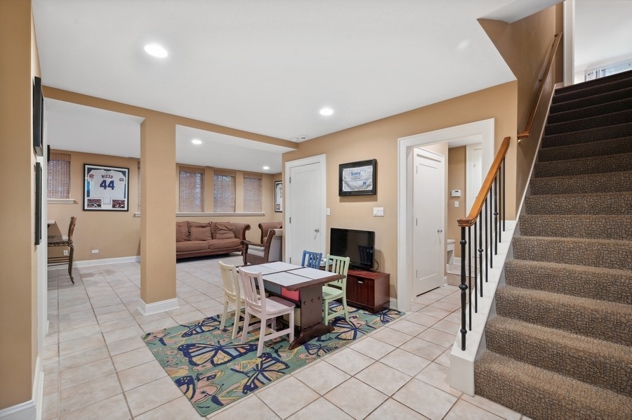 501 Ridge Road Kenilworth, IL 60043 - Photo 31 of 46 a workspace with furniture and stairs