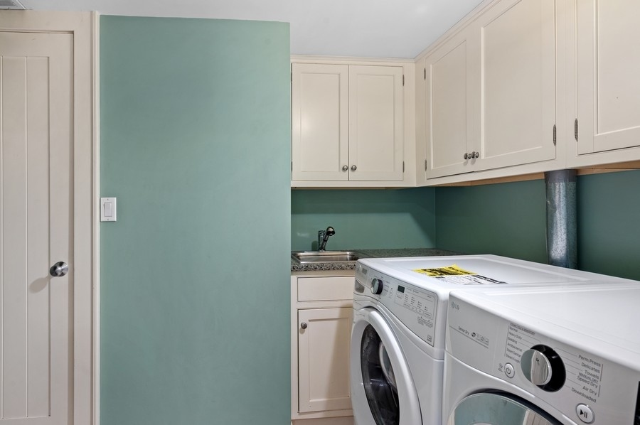 501 Ridge Road Kenilworth, IL 60043 - Photo 36 of 46 a utility room with dryer and washer