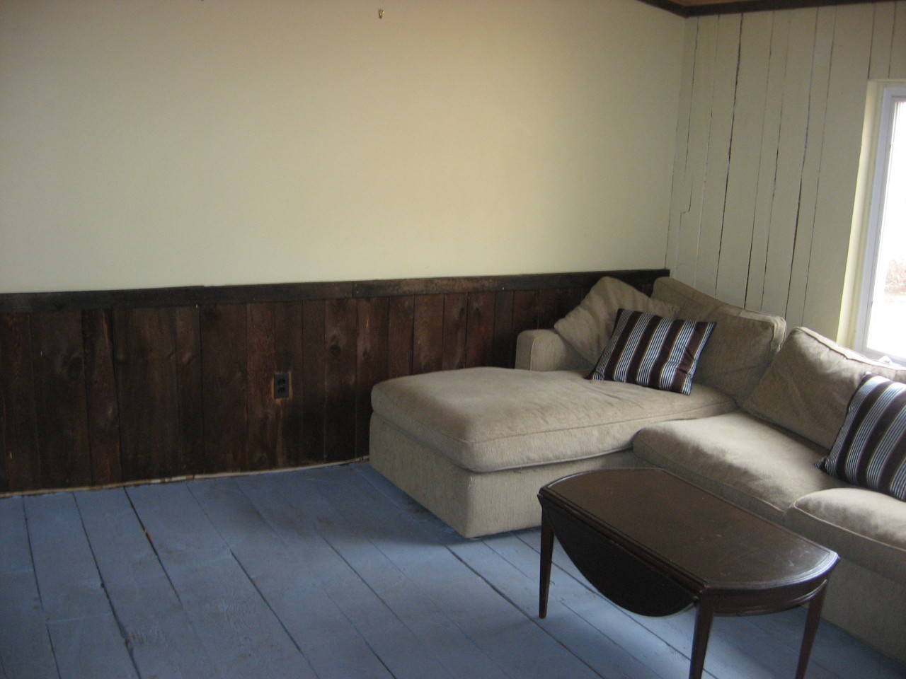 132 Sandy Brook Road Sandisfield, MA 01255 - Photo 8 of 11 a living room with furniture and a gate