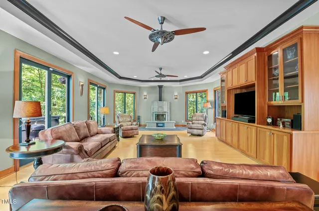 a view of an empty room with a piano