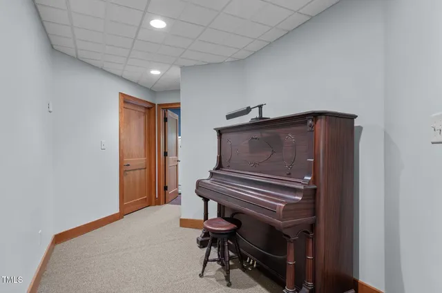 a bedroom with furniture and a fireplace