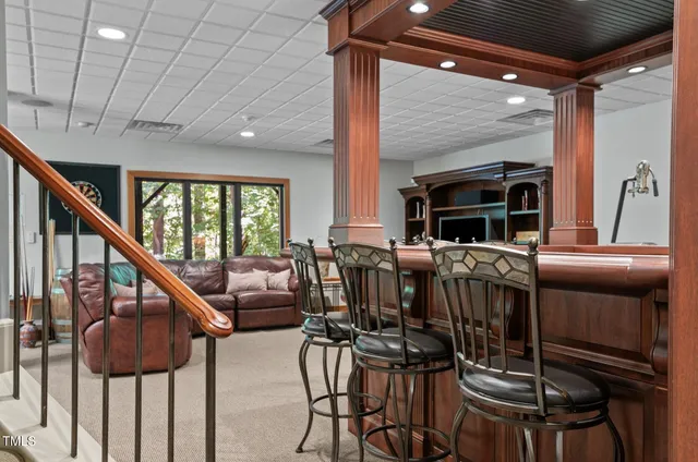 a large bathroom with a large tub and sink