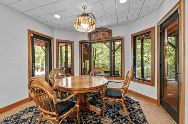 a bathroom with a shower and a sink