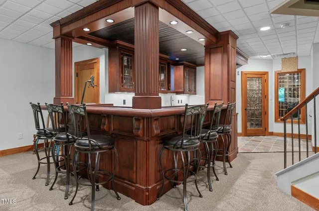 a bathroom with a shower and a bath tub
