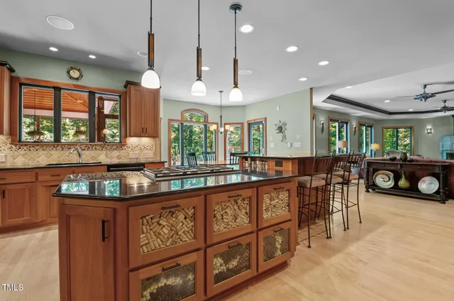 a view of a two chairs in the balcony