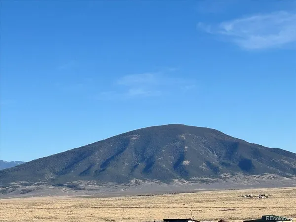 a view of ocean and mountain