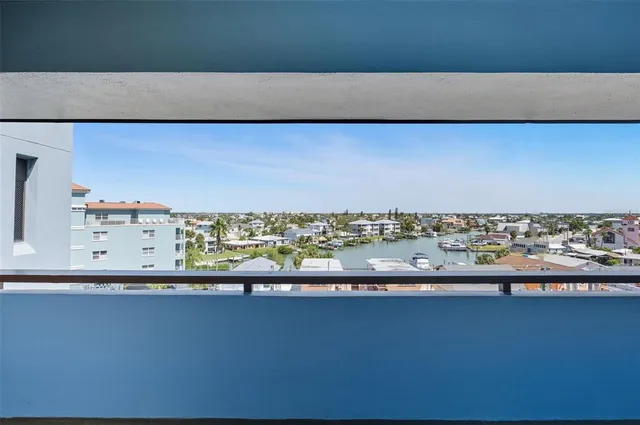 a view of swimming pool with outdoor seating