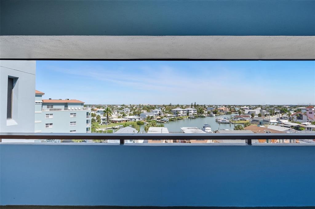 13720 Gulf Boulevard, Unit 609 Madeira Beach, FL 33708 - Photo 31 of 40 a view of a balcony with an outdoor space