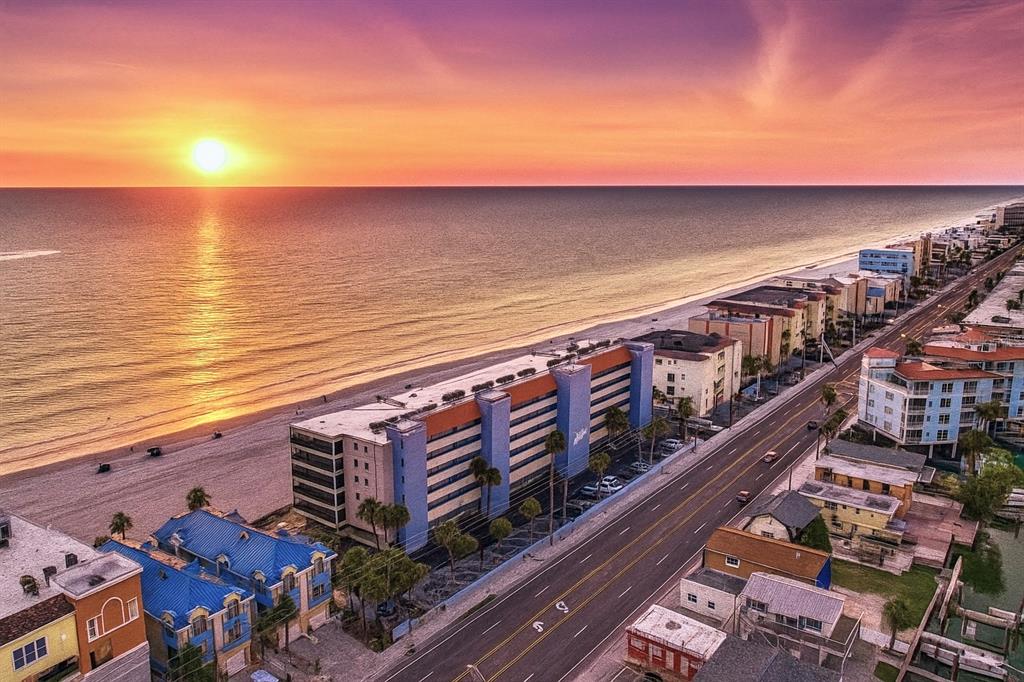 13720 Gulf Boulevard, Unit 609 Madeira Beach, FL 33708 - Photo 6 of 40 a view of building with ocean view