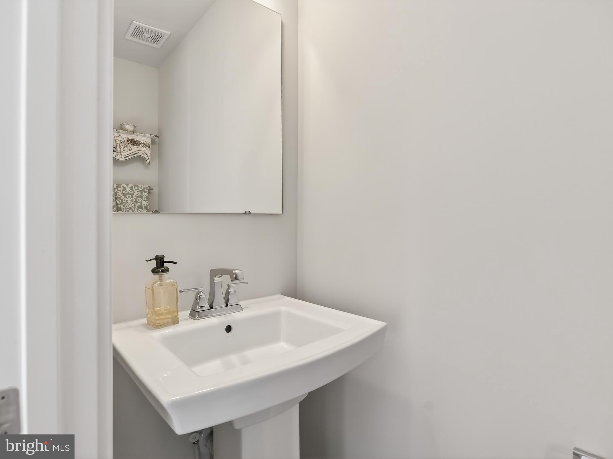 1724 Scenic Loop Culpeper, VA 22701 - Photo 11 of 29 a white sink sitting next to a white sink
