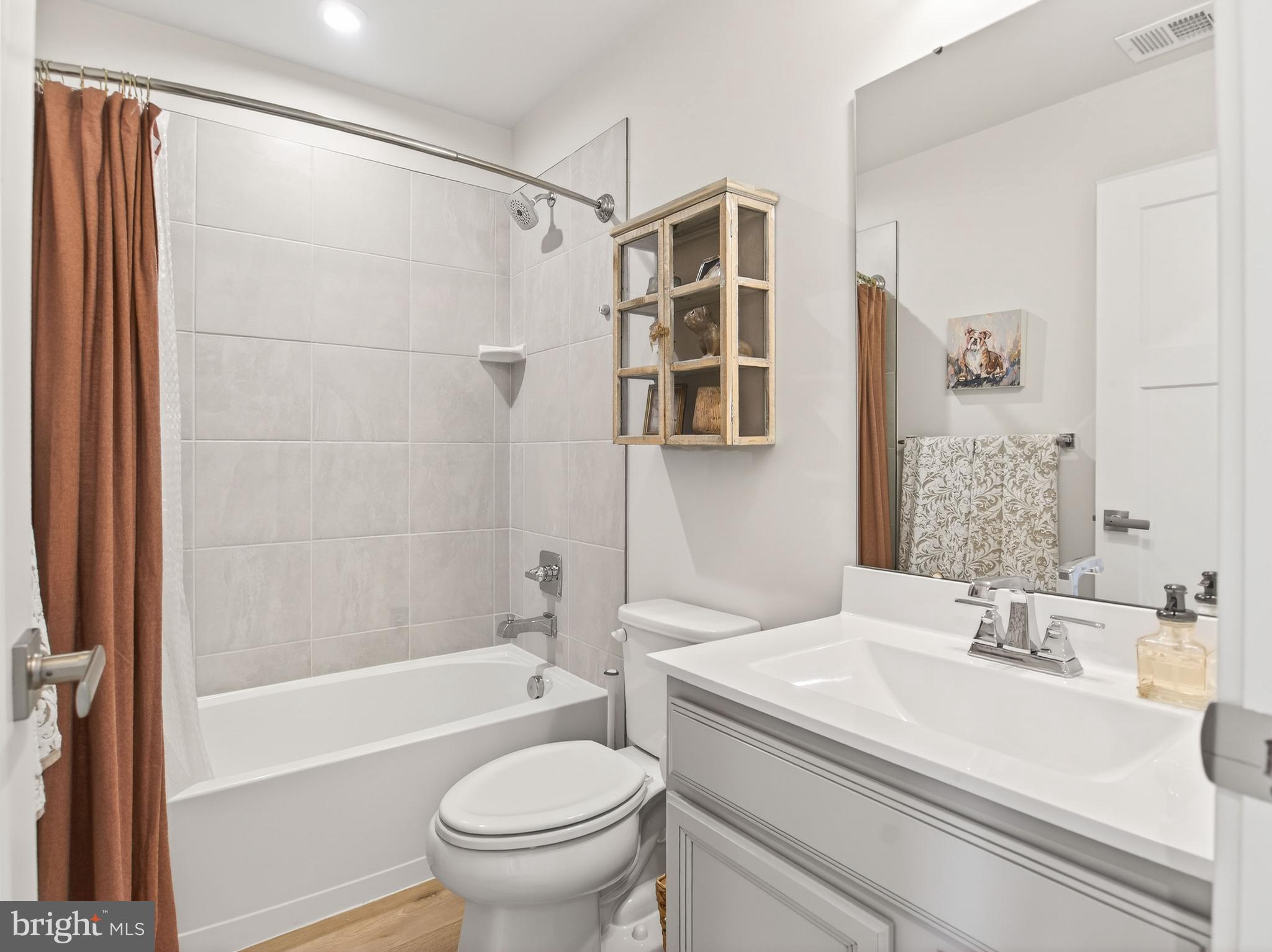 1724 Scenic Loop Culpeper, VA 22701 - Photo 22 of 29 a bathroom with a sink toilet and shower