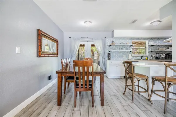 a kitchen with stainless steel appliances granite countertop lots of counter top space