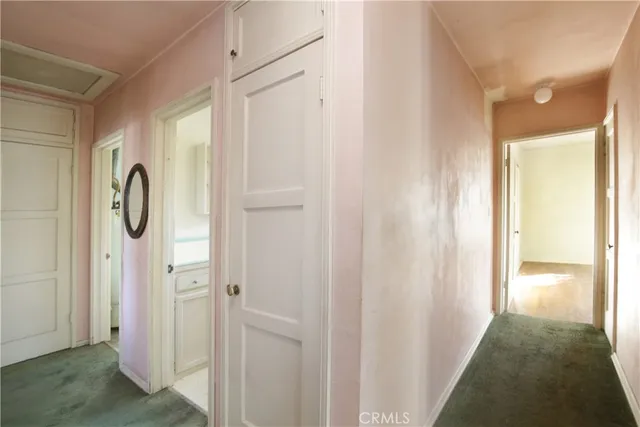 a view of a hallway with elevator