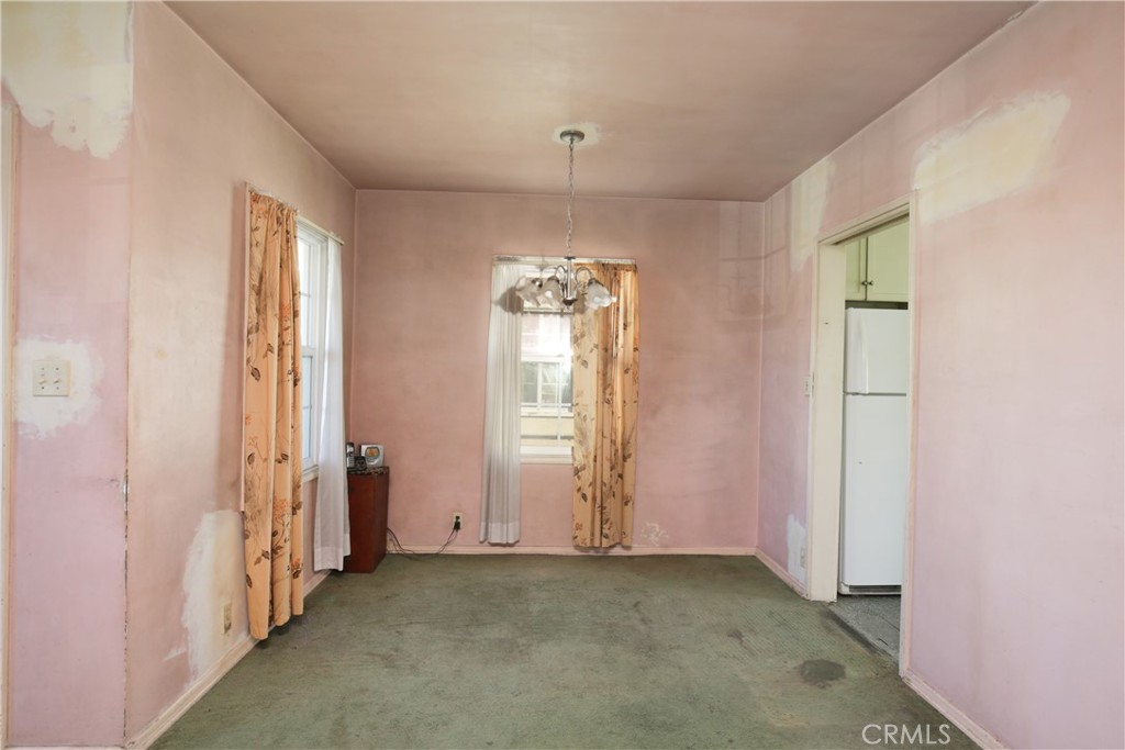 1618 West 9th Street Santa Ana, CA 92703 - Photo 6 of 29 an empty room with windows and closet