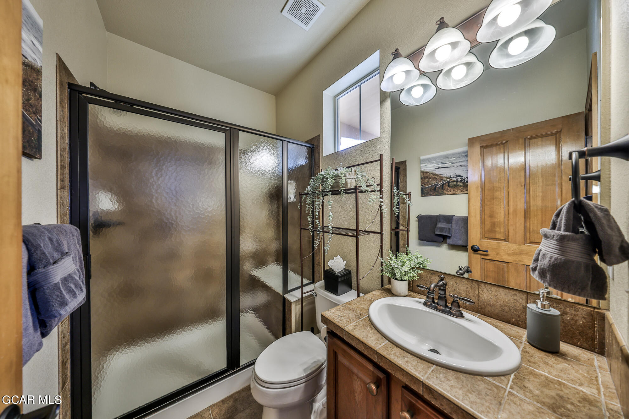 113 Summit Point Lane Granby, CO 80446 - Photo 15 of 43 a bathroom with a sink toilet and shower