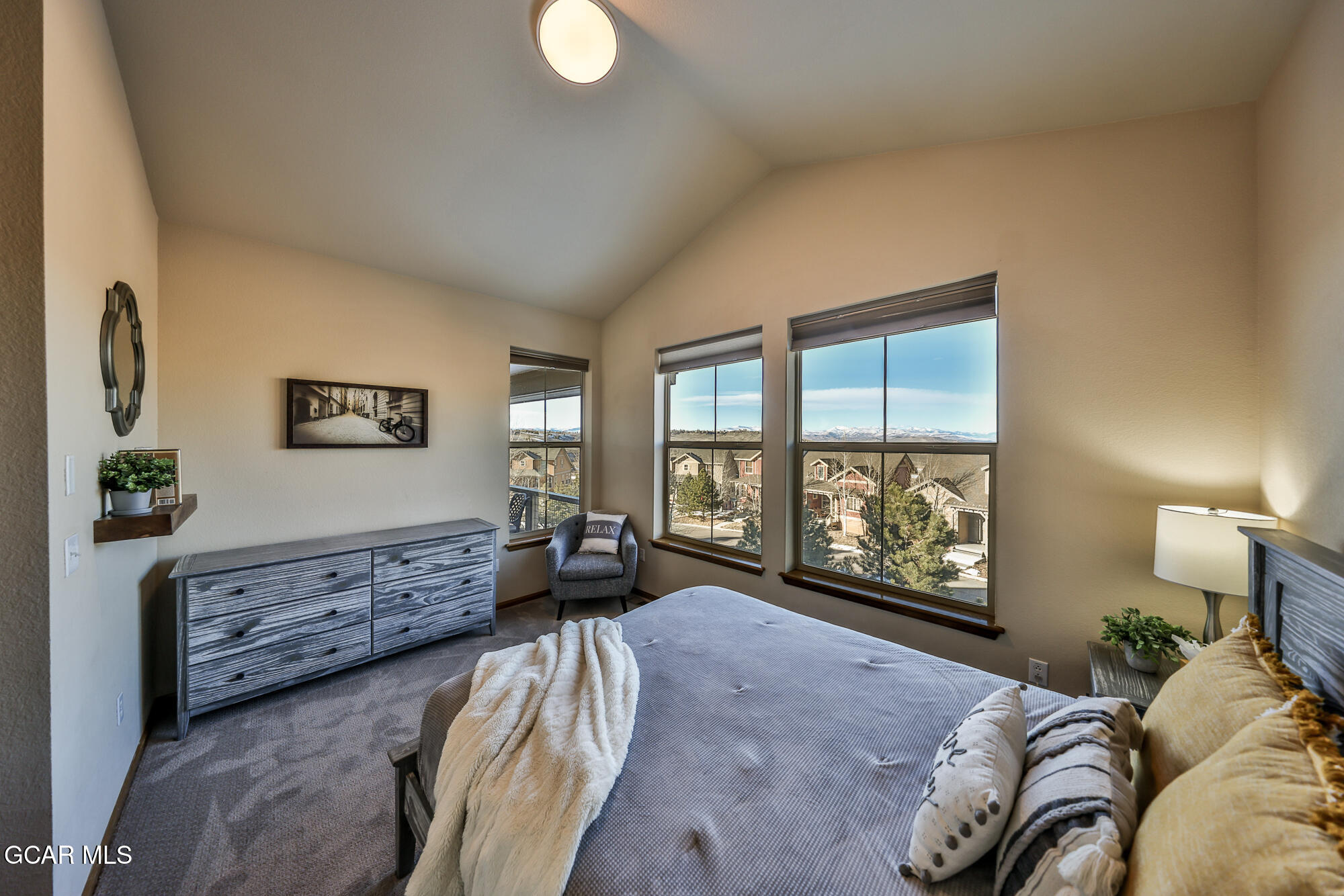 113 Summit Point Lane Granby, CO 80446 - Photo 18 of 43 a bedroom with a bed and a large window