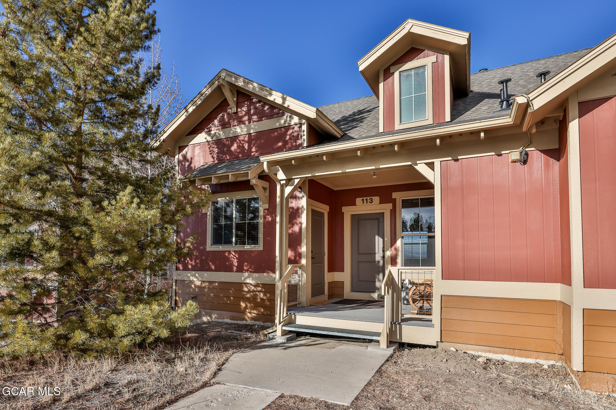 113 Summit Point Lane Granby, CO 80446 - Photo 30 of 43 front view of a house with a small yard