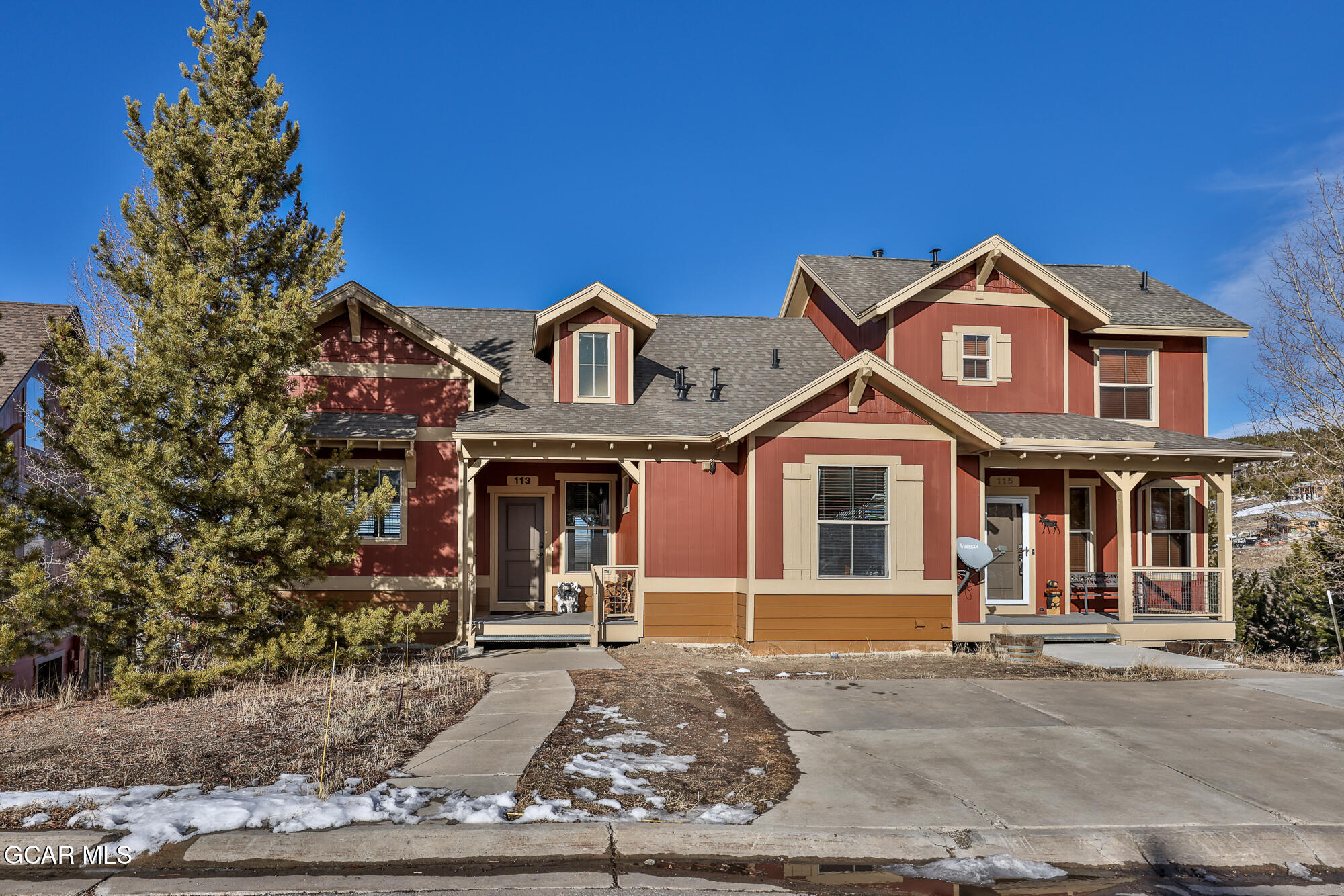 113 Summit Point Lane Granby, CO 80446 - Photo 31 of 43 a front view of a house with a yard
