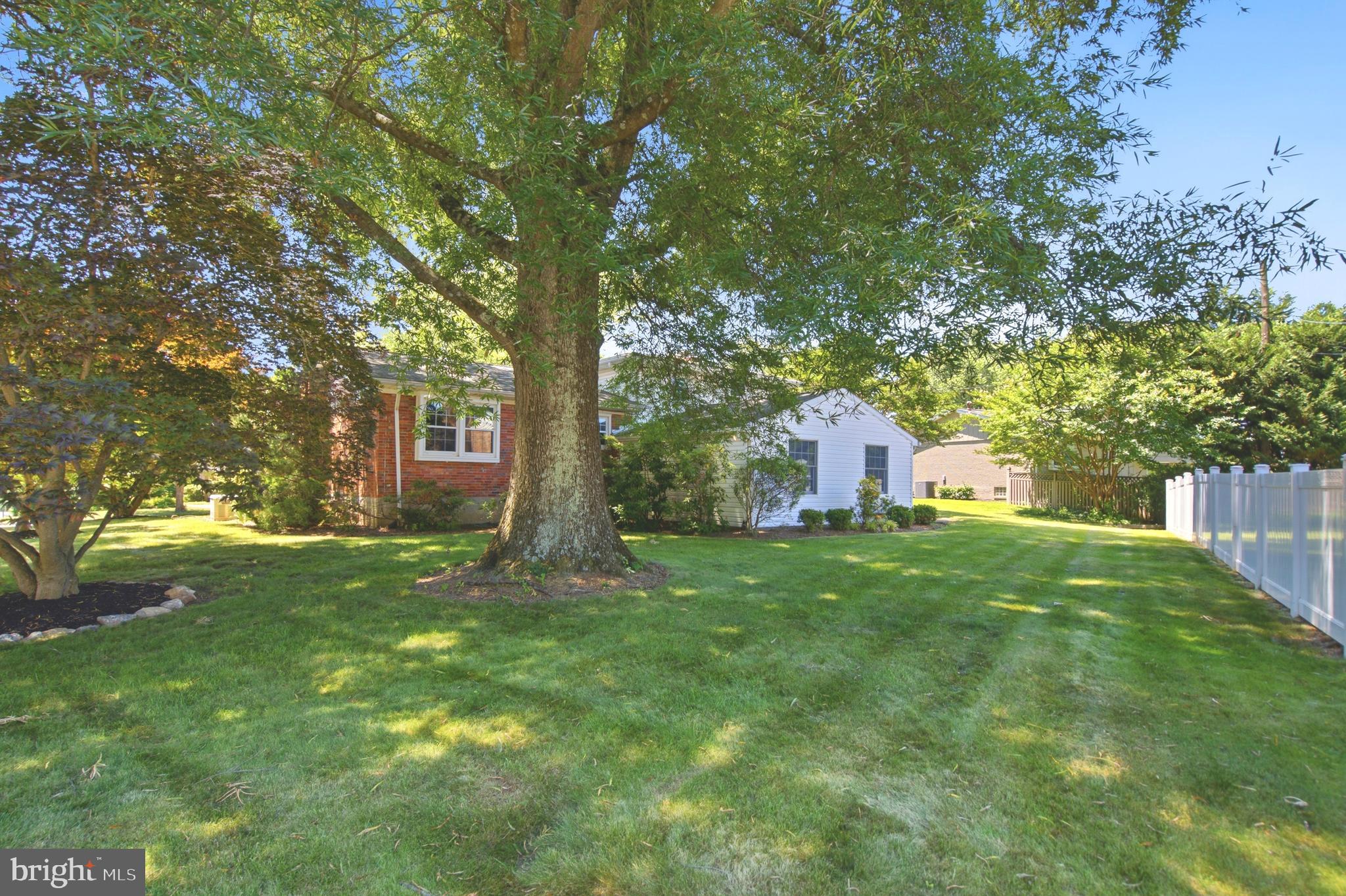 220 Solway Road Lutherville-Timonium, MD 21093 - Photo 35 of 38 a backyard of a house with table and chairs