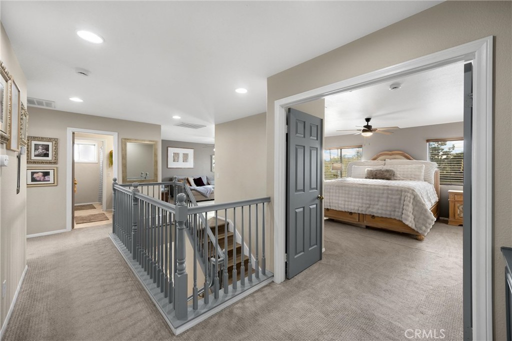 6861 Rio Grande Drive Eastvale, CA 91752 - Photo 24 of 36 a view of a bedroom with furniture and windows