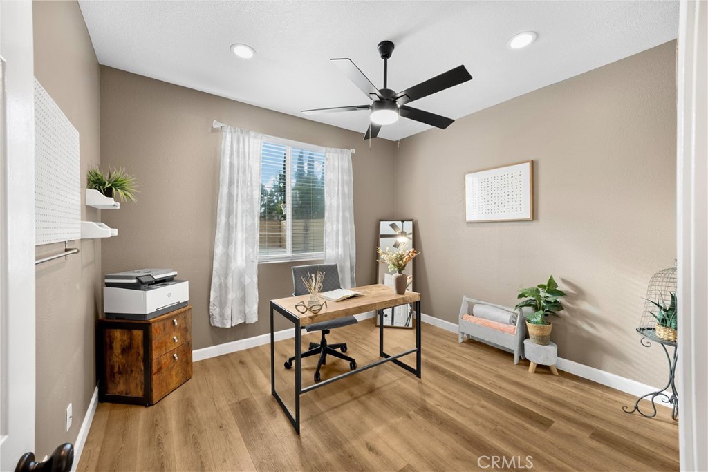 6861 Rio Grande Drive Eastvale, CA 91752 - Photo 28 of 36 a workspace with furniture window and wooden floor