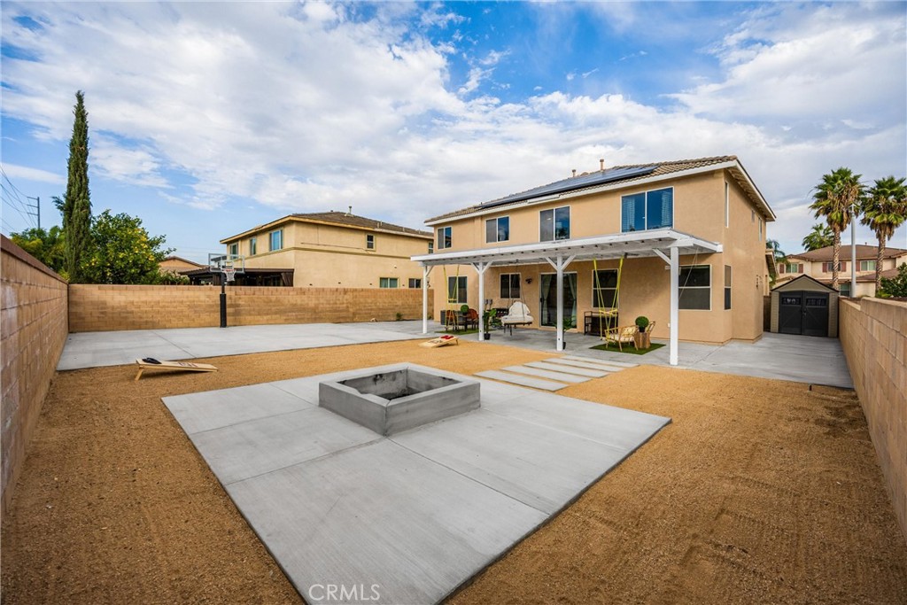 6861 Rio Grande Drive Eastvale, CA 91752 - Photo 33 of 36 a front view of a house with yard