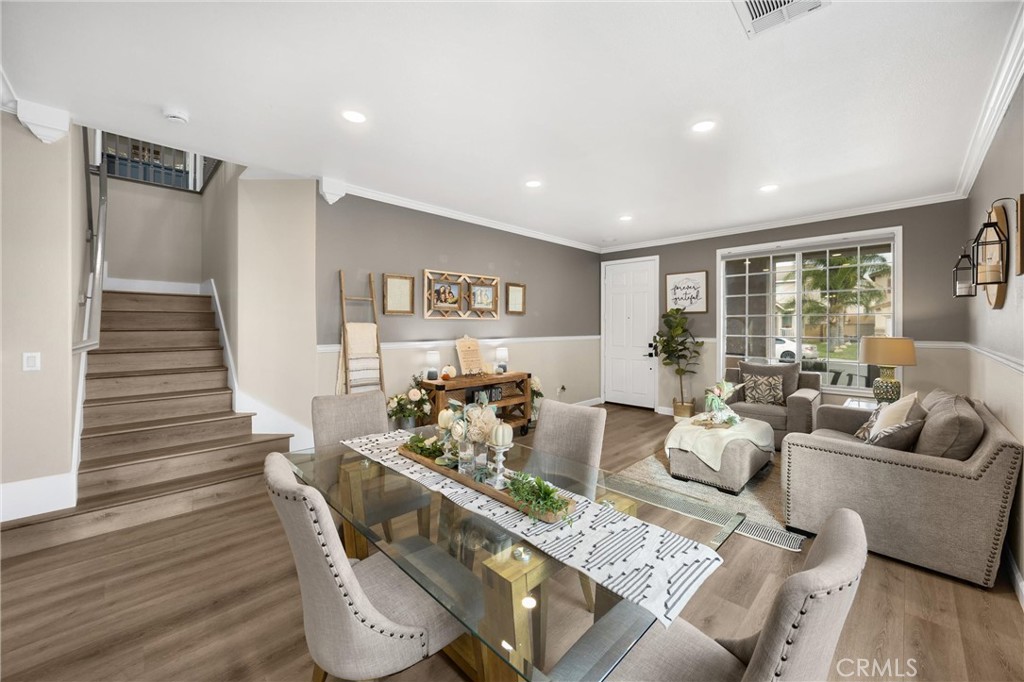 6861 Rio Grande Drive Eastvale, CA 91752 - Photo 8 of 36 a living room with furniture and wooden floor
