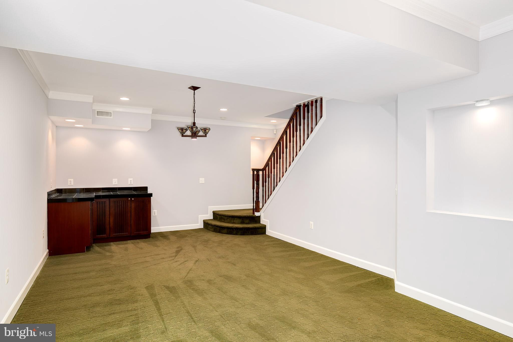 6901 Newman Road Clifton, VA 20124 - Photo 14 of 30 Recreation Room w/ Built-in Buffet