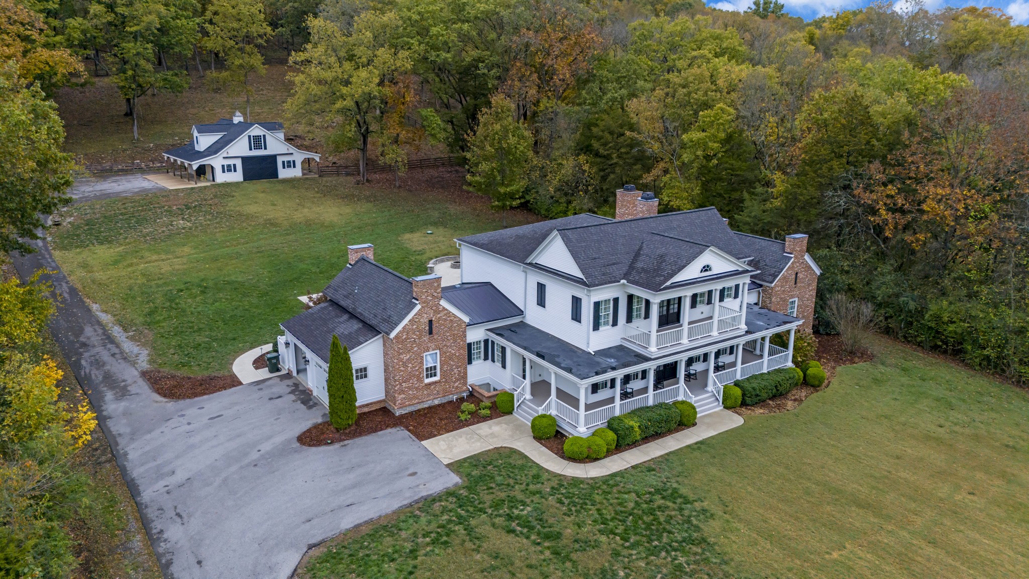 3290 Carl Road Franklin, TN 37064 - Photo 4 of 84 an aerial view of a house with a big yard and large trees