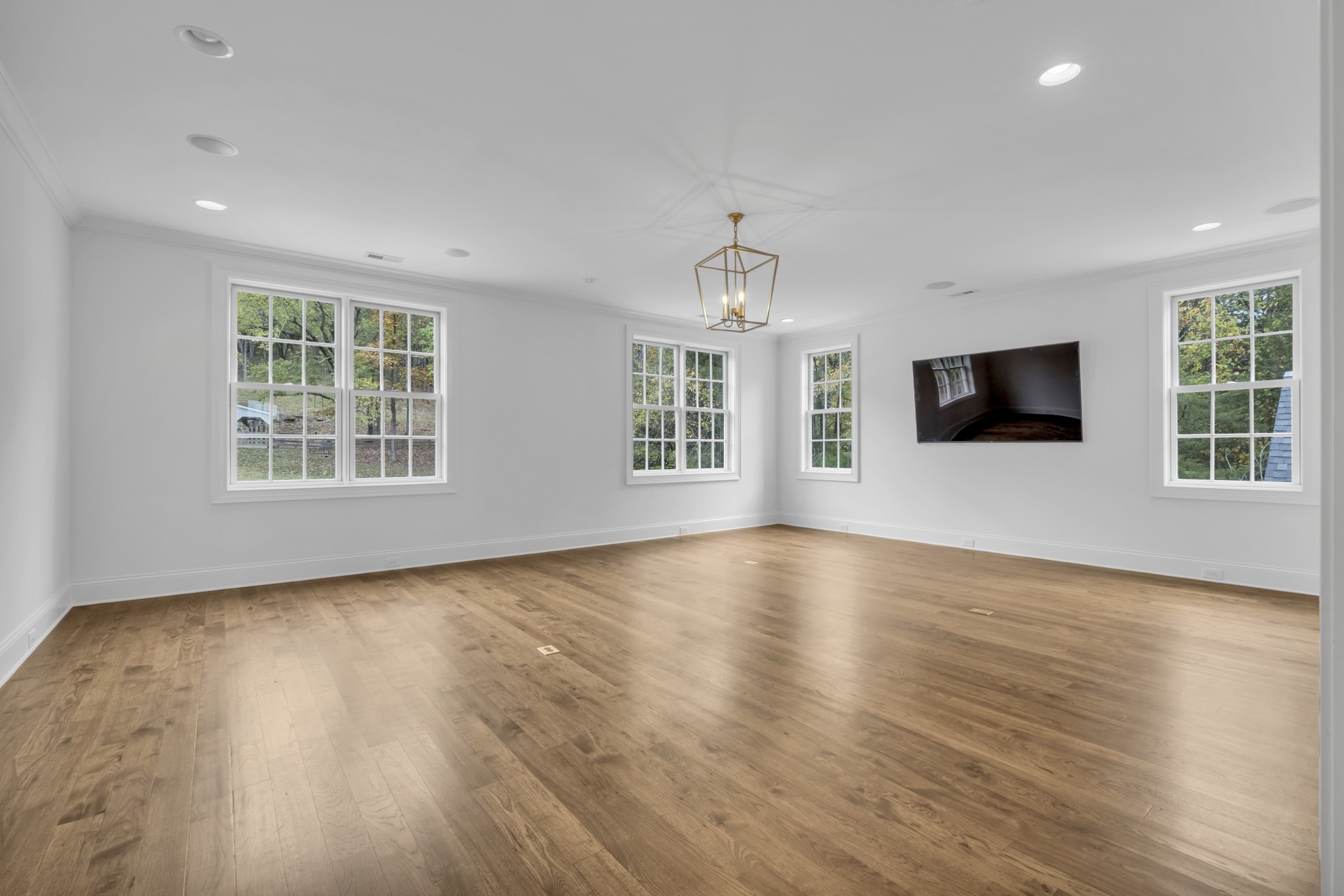 3290 Carl Road Franklin, TN 37064 - Photo 58 of 84 a view of an empty room with wooden floor and windows