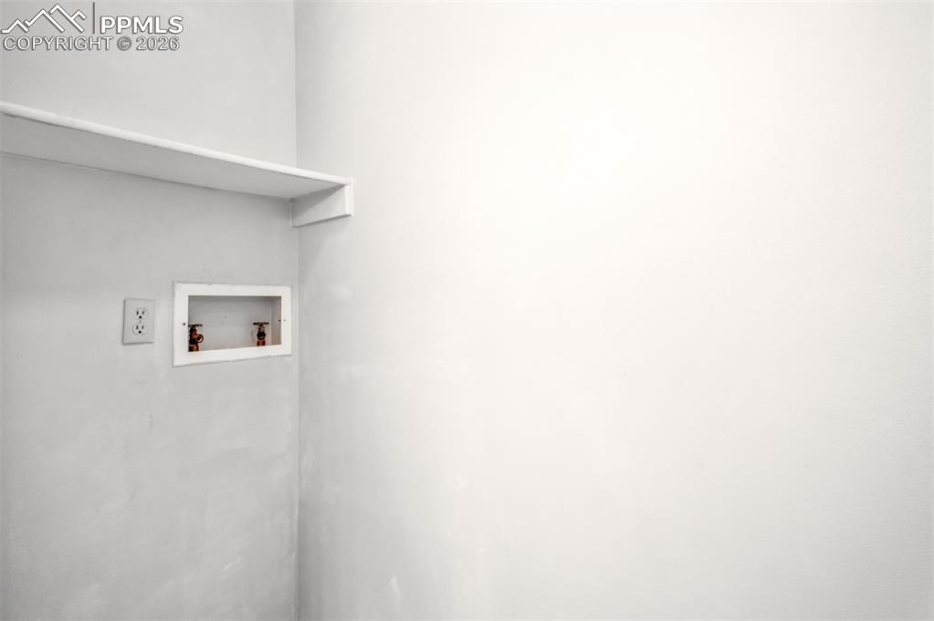 541 Blossom Field Road Fountain, CO 80817 - Photo 21 of 35 a picture of a wall with a window