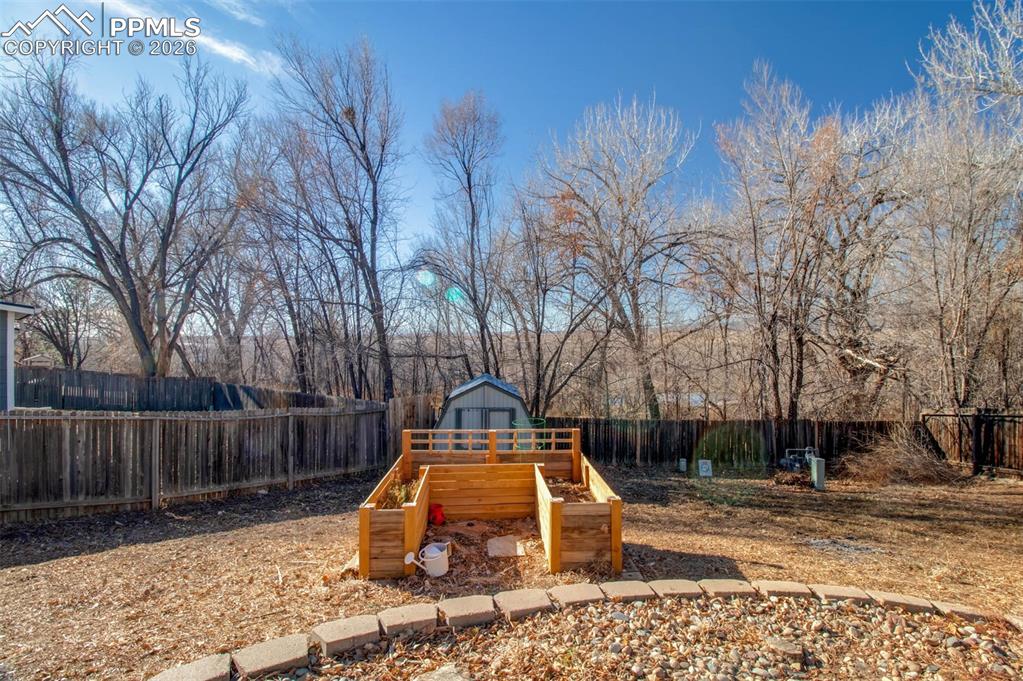 541 Blossom Field Road Fountain, CO 80817 - Photo 25 of 35 a view of a yard with wooden fence