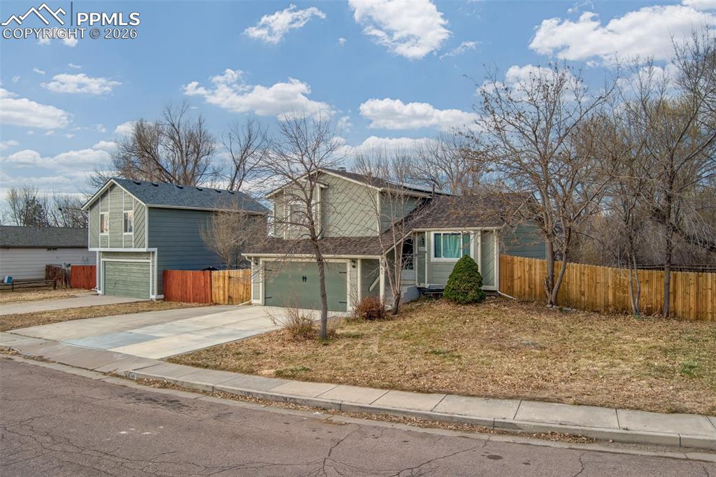 541 Blossom Field Road Fountain, CO 80817 - Photo 28 of 35 a view of a house with a snow in the yard