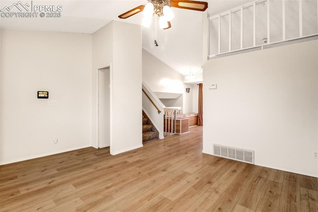 541 Blossom Field Road Fountain, CO 80817 - Photo 3 of 35 a view of a hallway with wooden floor and entryway