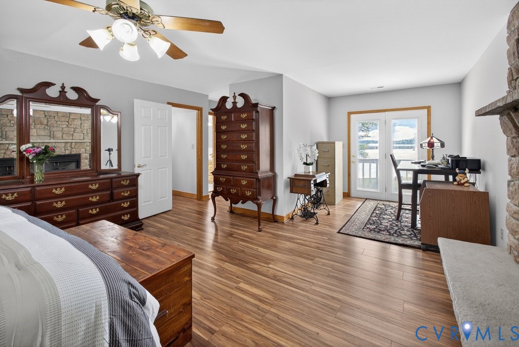173 Covenant Way Bumpass, VA 23024 - Photo 29 of 63 Spacious room with wood flooring, light grey walls