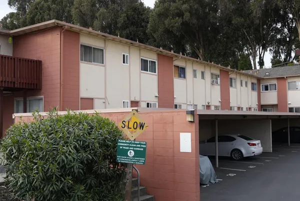 a view of a back yard of the house