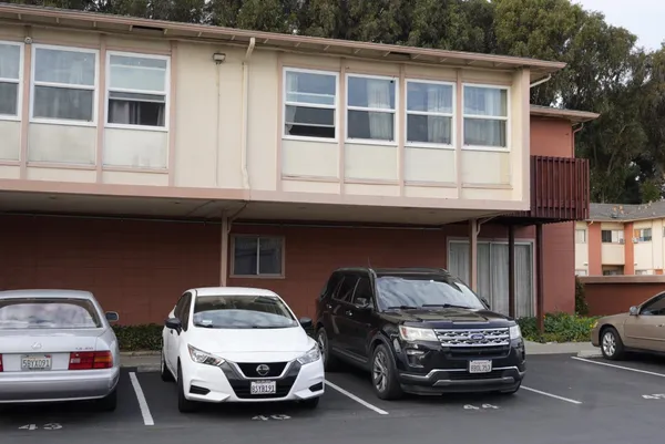 a car parked in front of a building