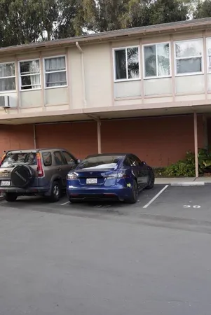 a car parked in front of a house