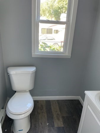253 Draper Street Springfield, MA 01108 - Photo 13 of 38 a bathroom with a toilet and a sink