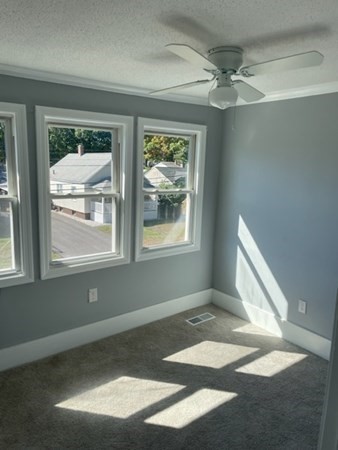 253 Draper Street Springfield, MA 01108 - Photo 26 of 38 a view of an empty room with a window