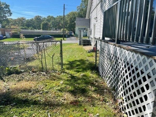 253 Draper Street Springfield, MA 01108 - Photo 33 of 38 a view of backyard with swimming pool and seating