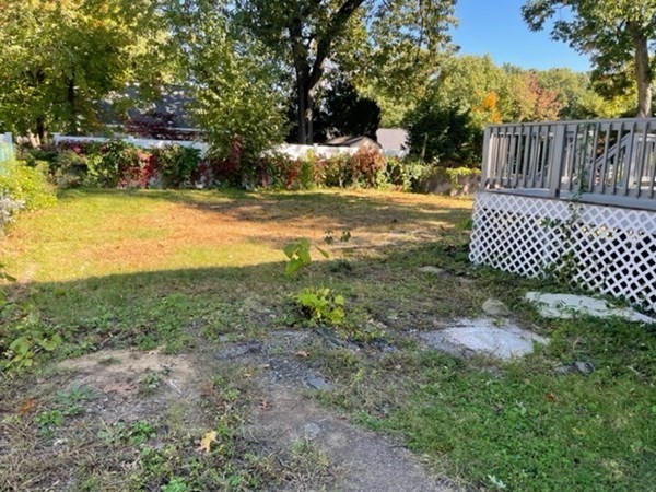 253 Draper Street Springfield, MA 01108 - Photo 34 of 38 a view of a yard with wooden fence