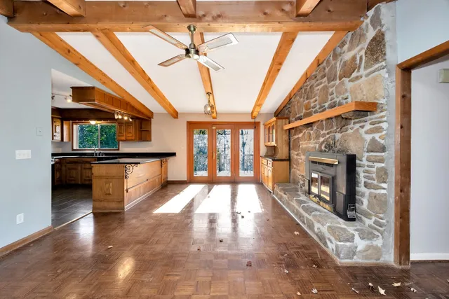a kitchen with stainless steel appliances granite countertop a stove and a sink