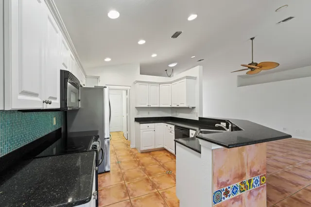 $575,000 | 12456 Southeast Plandome Drive, Hobe Sound, FL 33455