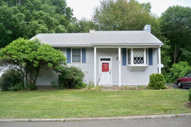 451 Intervale Road Bridgeport, CT 06610 - Photo 1 of 1 a front view of a house with a garden