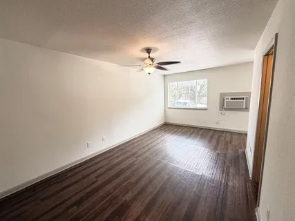 a kitchen that has a sink and a stove